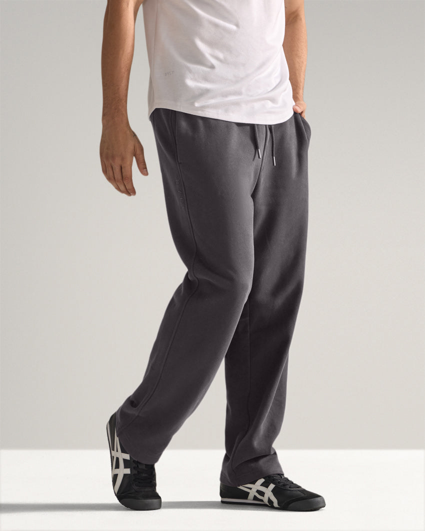 Dark-Charcoal | Three-quarter side view of the Heavyweight Fleece Pant showing relaxed straight leg